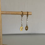 Boucles Kos – Fil de perles & étoile dorée
