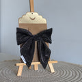 Barrette nœud Nola - Noir & paillettes argentées
