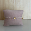 Bracelet élastique Amsterdam – Perles blanches, cœur doré & papillons