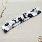 Bandeau Isadora en satin blanc à fleurs bleu marine