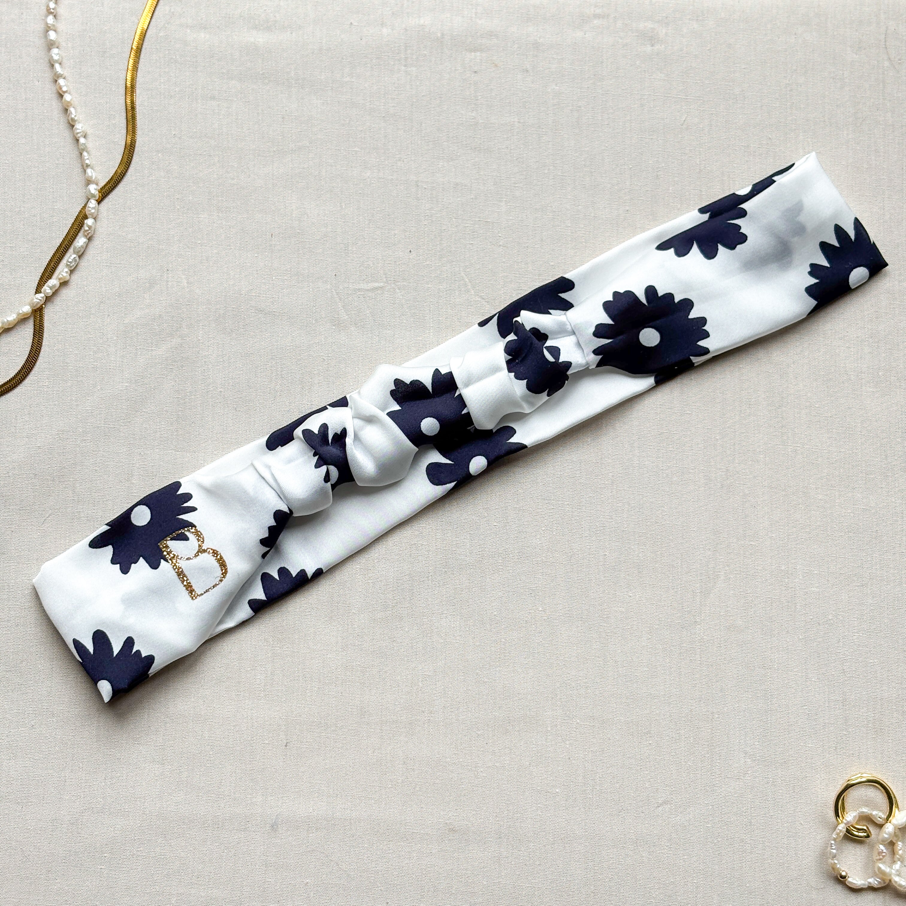 Bandeau Isadora en satin blanc à fleurs bleu marine