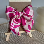 Barrette Nœud Célia – Soie rose vif & crème