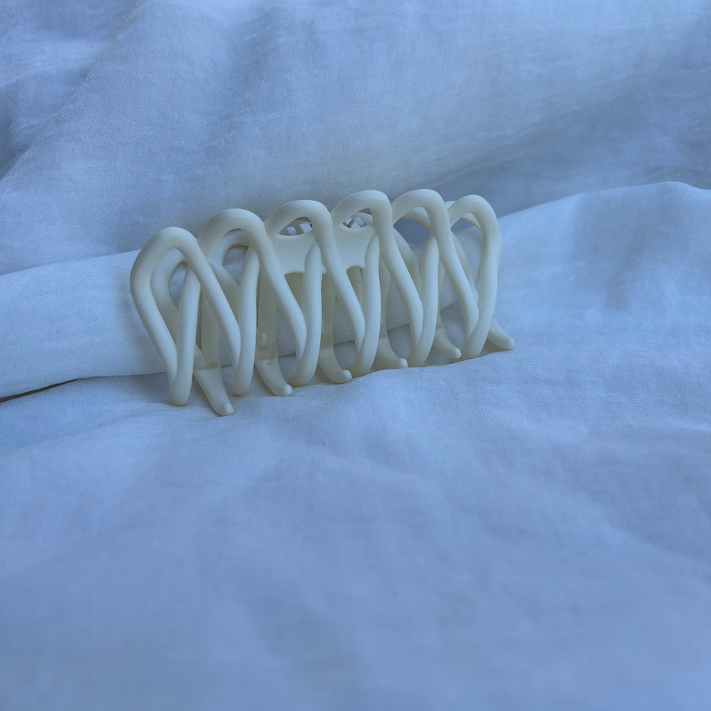 Pince entremêlée écrue