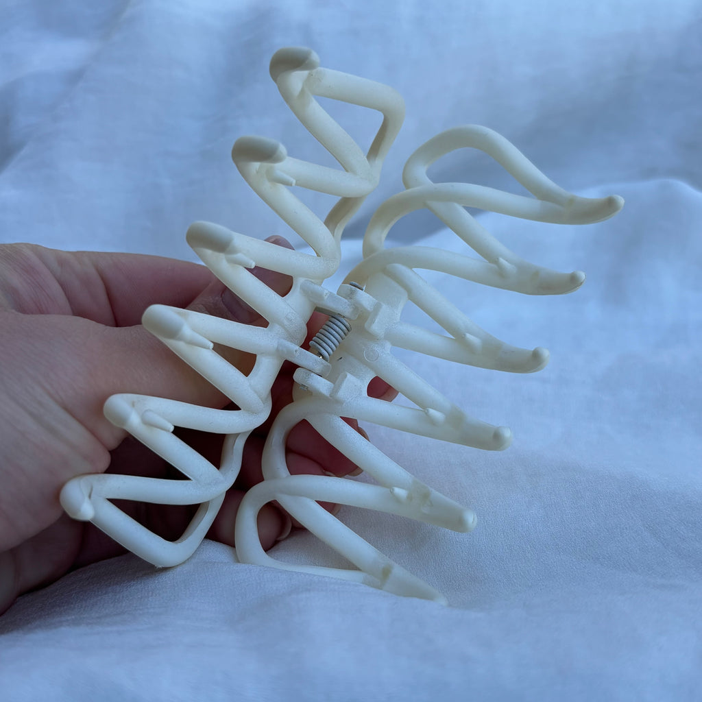 Pince entremêlée écrue