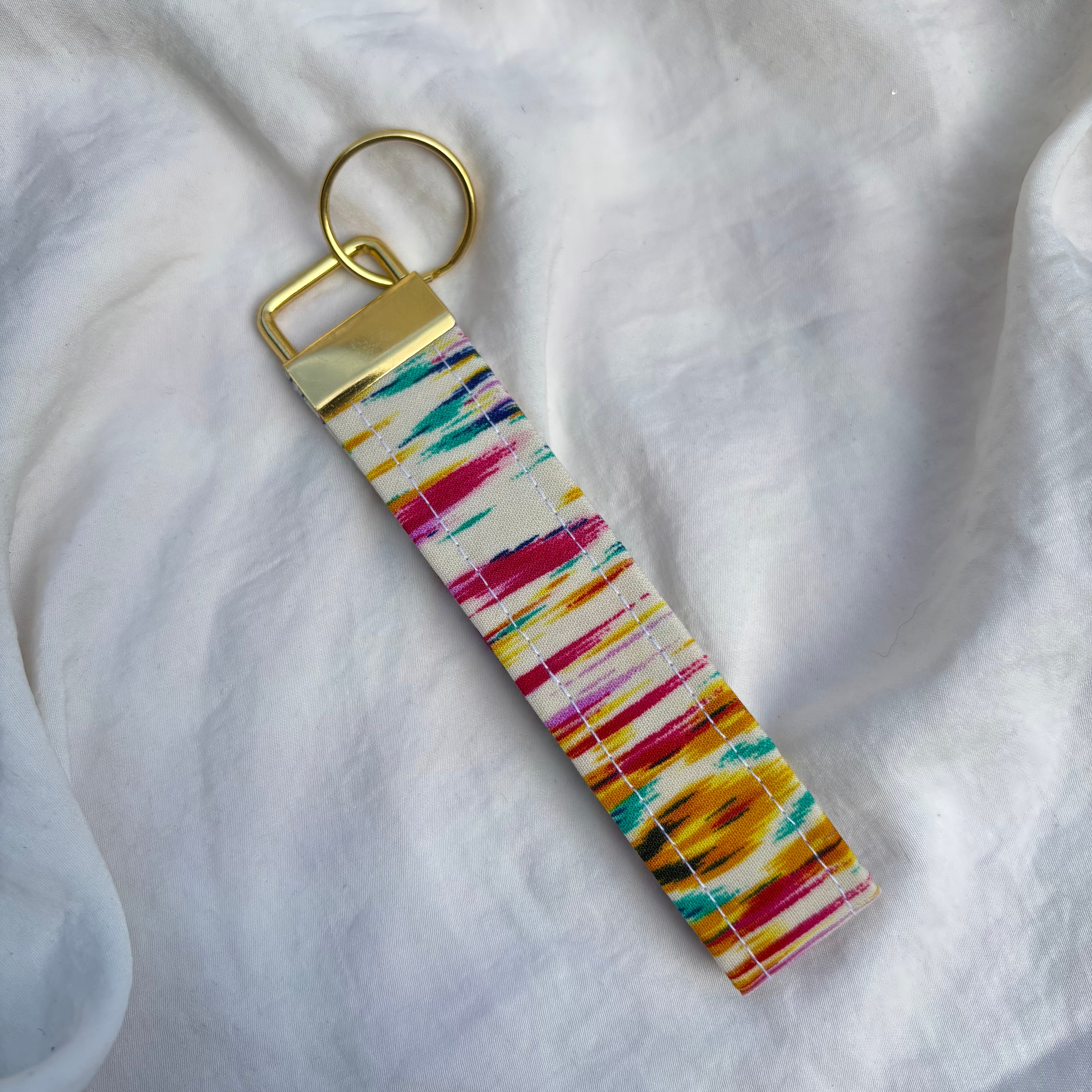 Porte Clé Deneb - Motif coloré avec finitions dorées