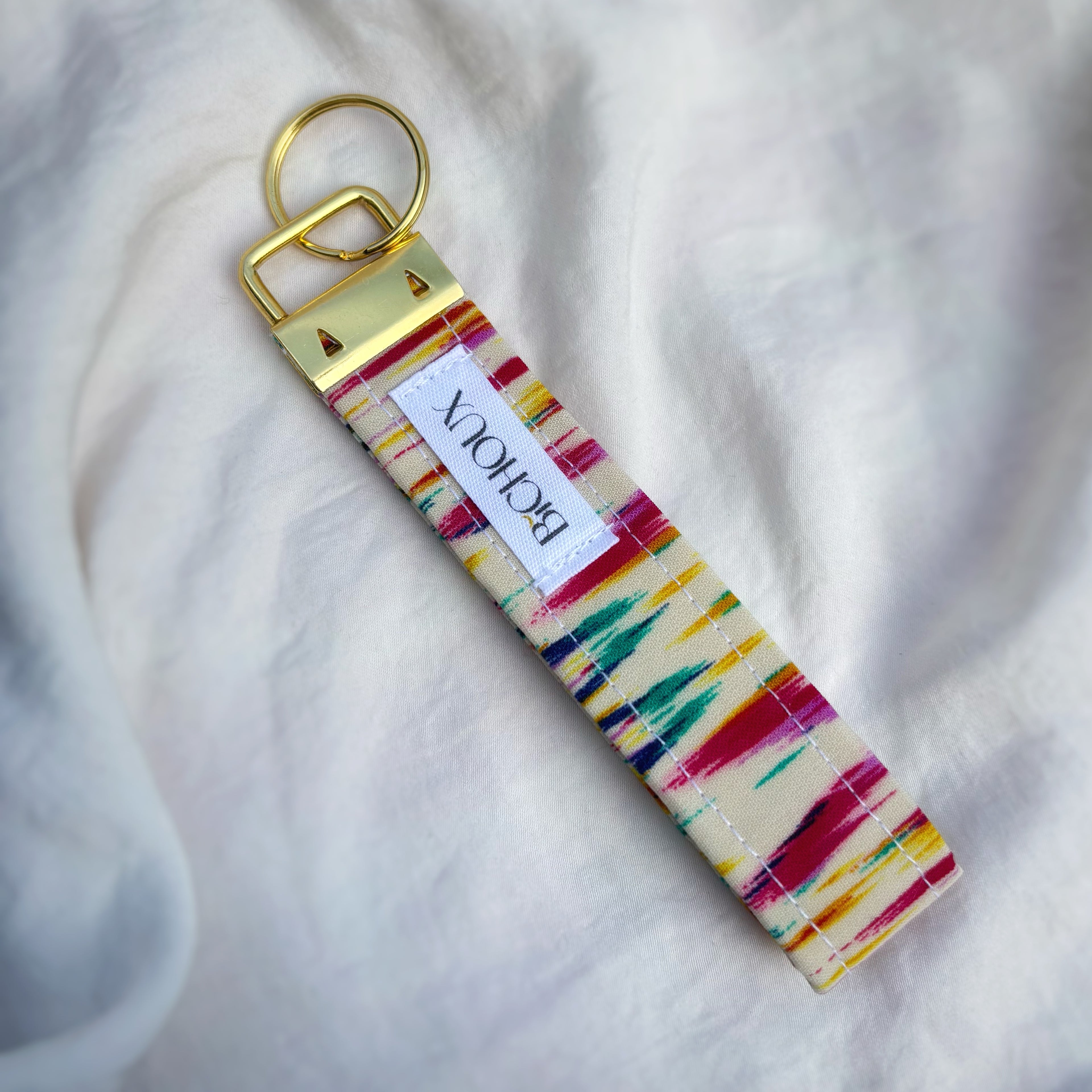 Porte Clé Deneb - Motif coloré avec finitions dorées