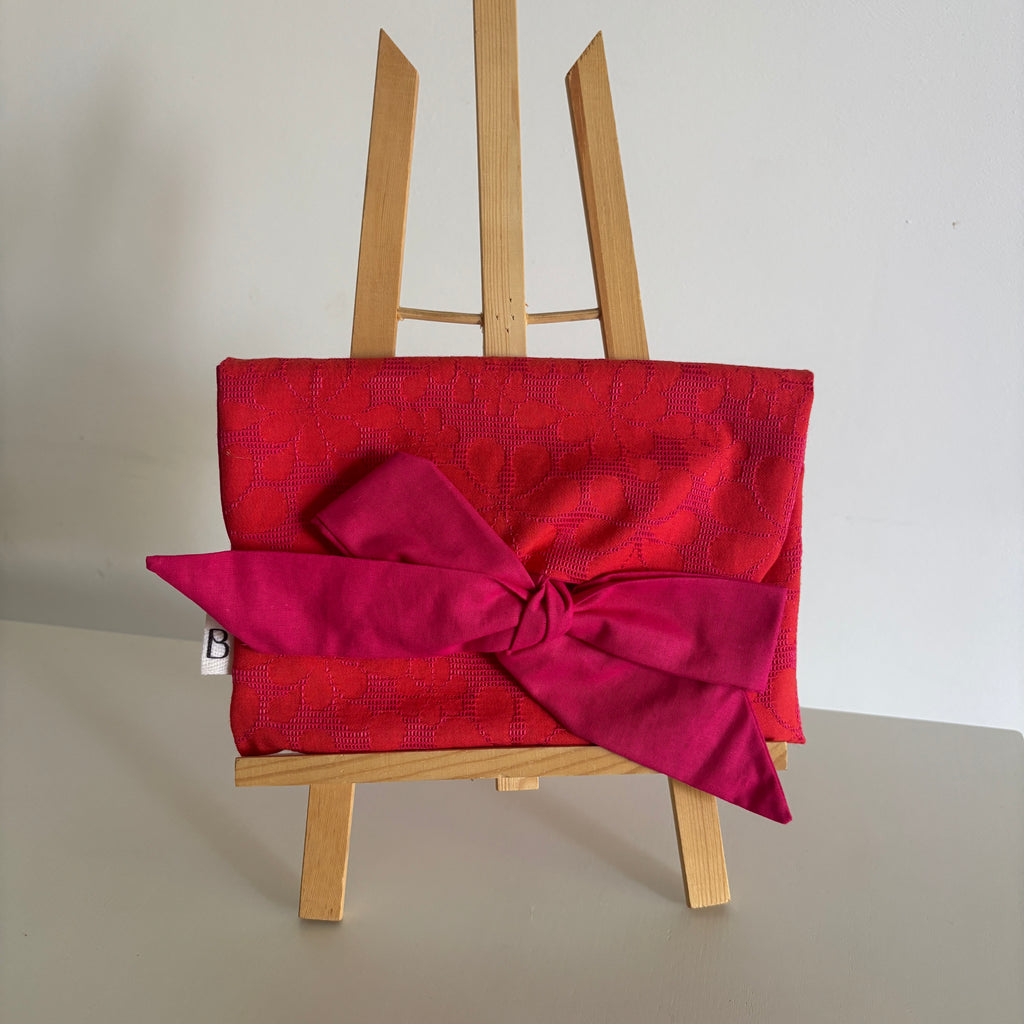 Pochette nouée fuchsia & orange en jacquard