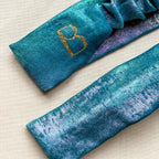 Bandeau Yasmine en satin bleu holographique