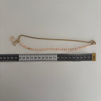 Collier Eloria – Perles roses et pendentif double cœur doré