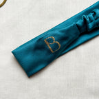 Bandeau Sélina en satin vert canard