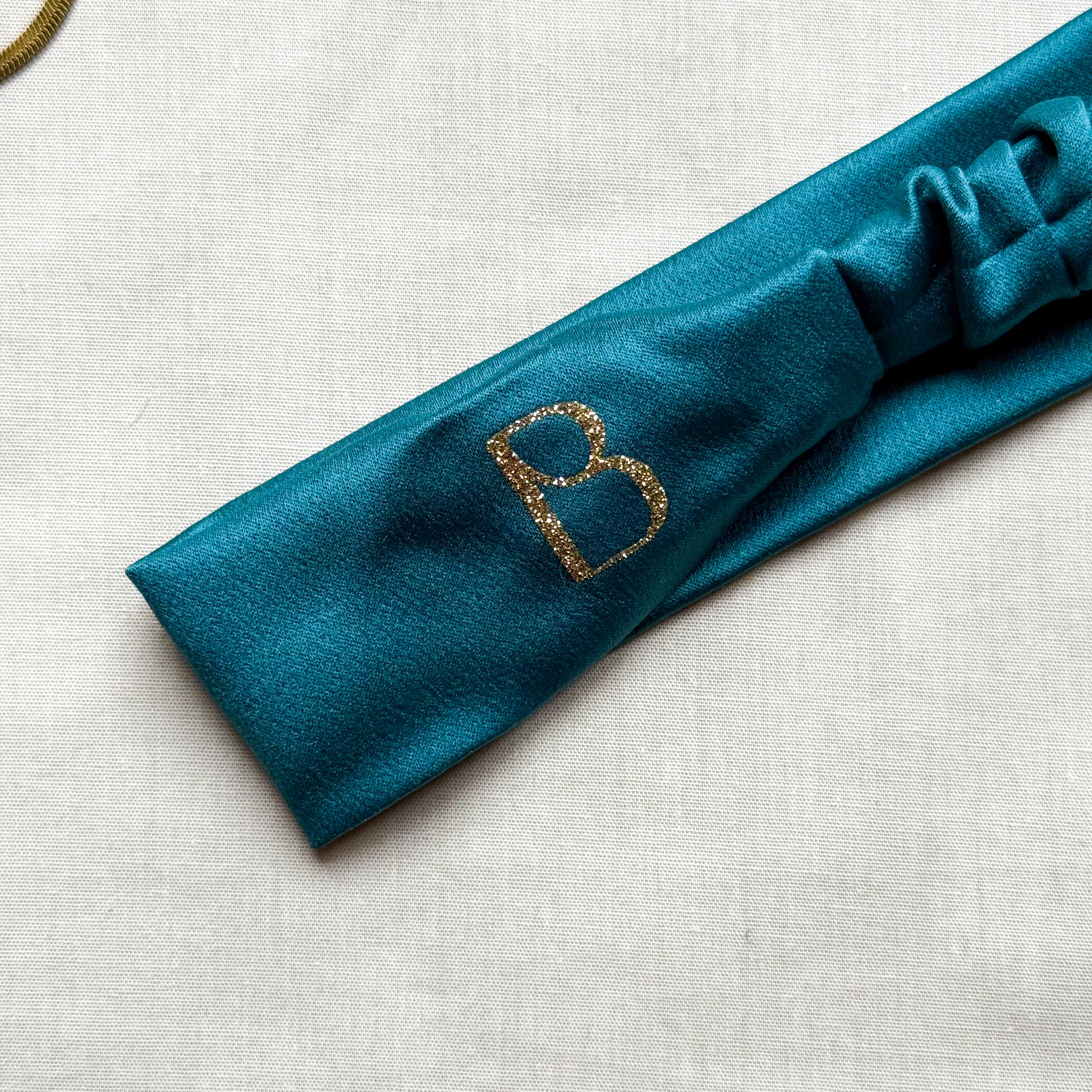 Bandeau Sélina en satin vert canard