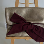Pochette nouée similicuir doré & bordeaux