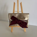 Pochette nouée similicuir doré & bordeaux