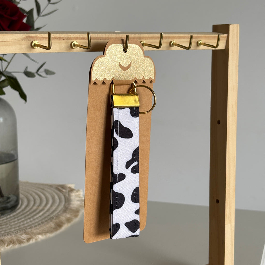 Porte-clés Dakota – Motif vache avec finitions dorées