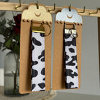 Porte-clés Dakota – Motif vache avec finitions dorées