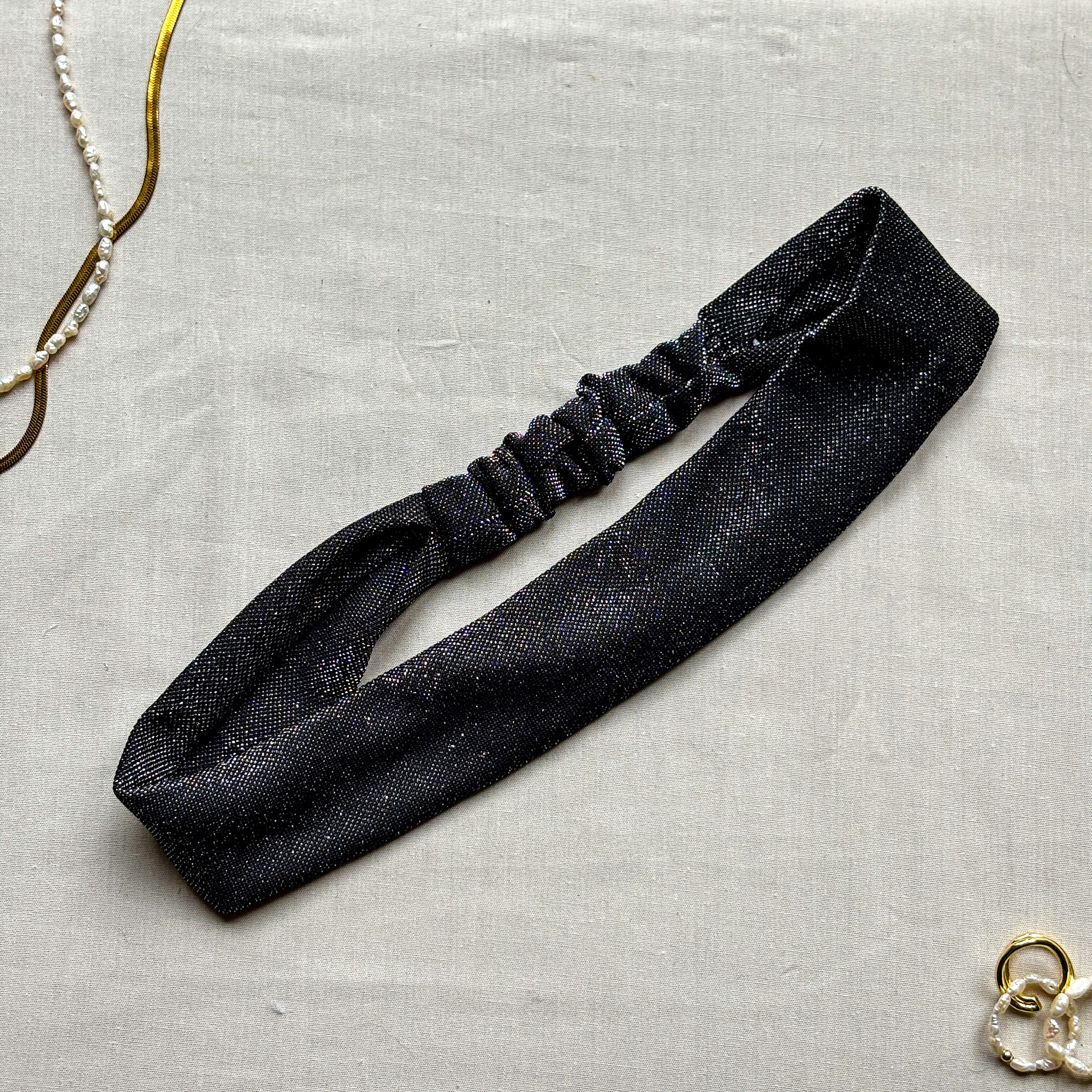 Bandeau Nola noir à paillettes argentées