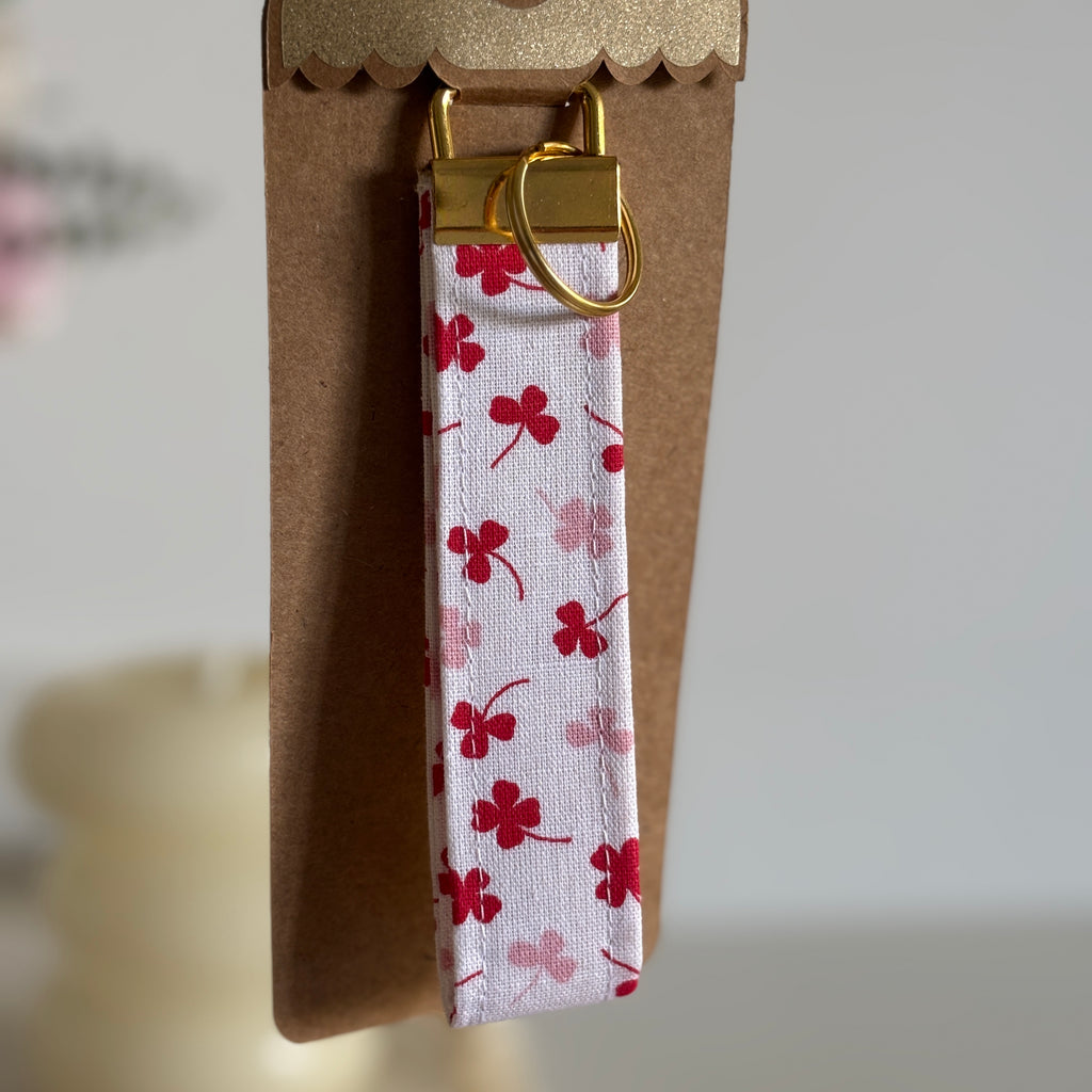 Porte-clés Rosea - Coton à trèfles roses & rouges avec finitions dorées